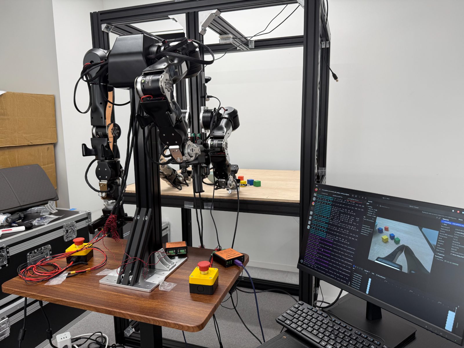 Bimanual robot arm rig with control electronics, emergency stop and engineering monitor